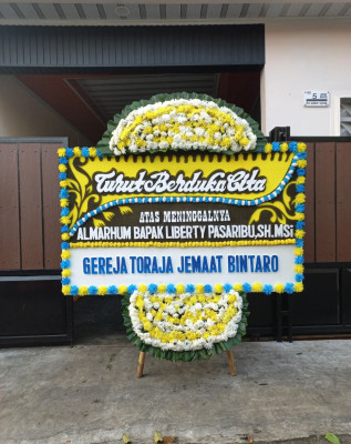 Papan Bunga Duka di Madidir Unet